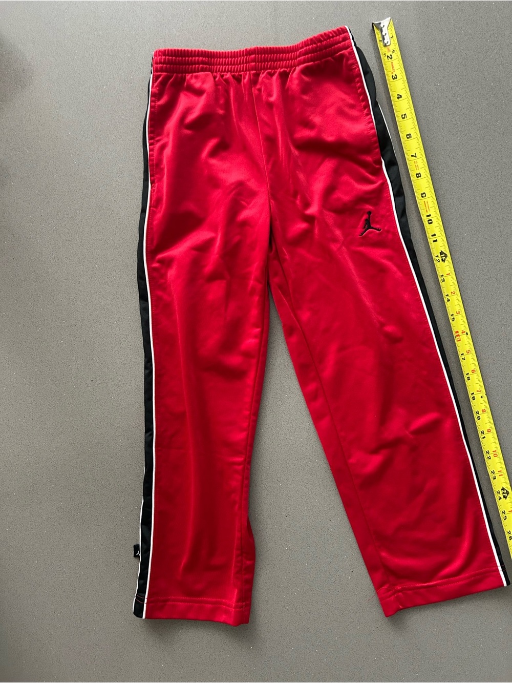 Jordan Kids' Red Track Pants with Black Side Stripe Size 6-7yrs..